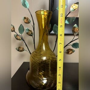 Vintage Art Glass Amber Vase. 11 inches tall with a swirled / optic pattern